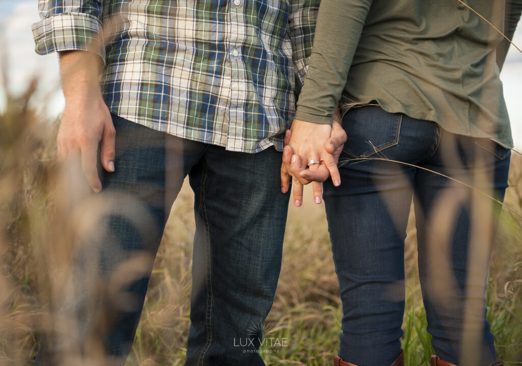 alexandria-bay-NY-engagement-couple-hands